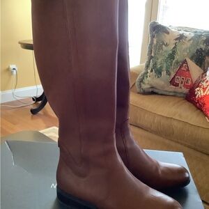 Women’s Cole Haan tall shaft leather riding boots w/stretch back calf. Chestnut
